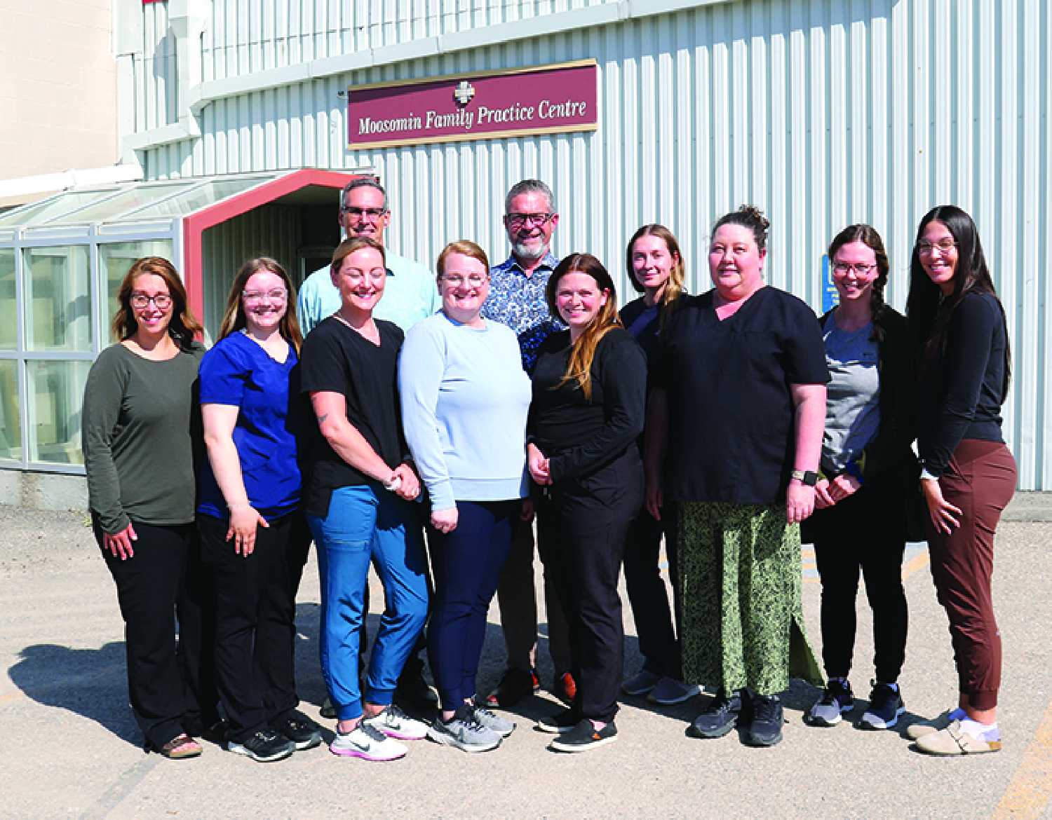 Dr. Ross Kerhhoff and Dr. Schalk van der Merwe and a few of their colleagues at the Moosomin Family Practice Centre